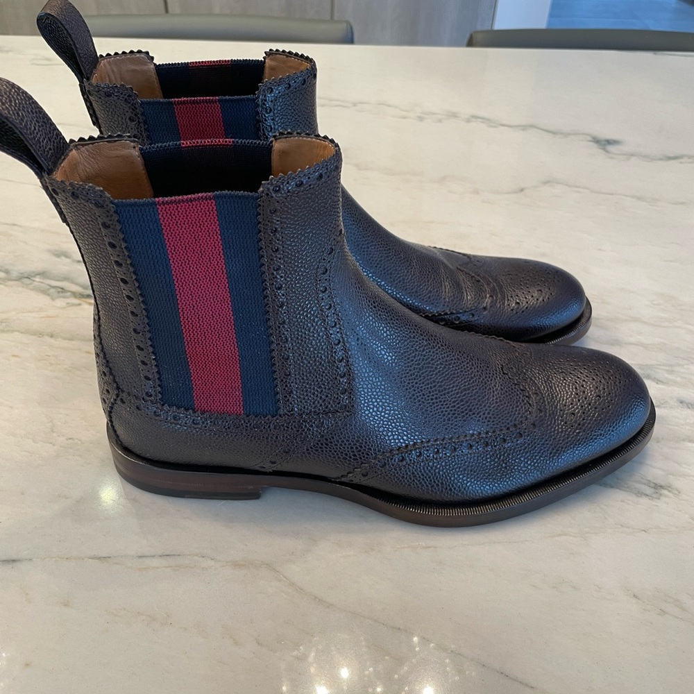 Gucci boots for men. Gucci size 9 men. Pre owned. Comes with dust bag. No box.
